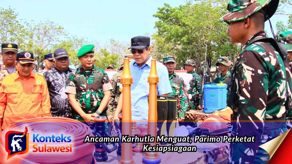 Bupati Parigi Moutong H. Erwin Burase saat memimpin apel siaga dan gelar pasukan serta peralatan menghadapi potensi karhutla dan kekeringan di Kecamatan Moutong. Foto: Diskominfo